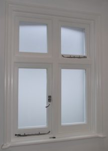 Satin glass casement window