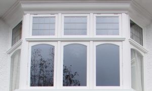 Timber casement bay window curved tops accoya London